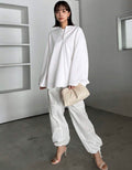 Trends
FRIFUL Women's Solid Color Front
Zip Long Sleeve Casual T-Shirt
Color: White